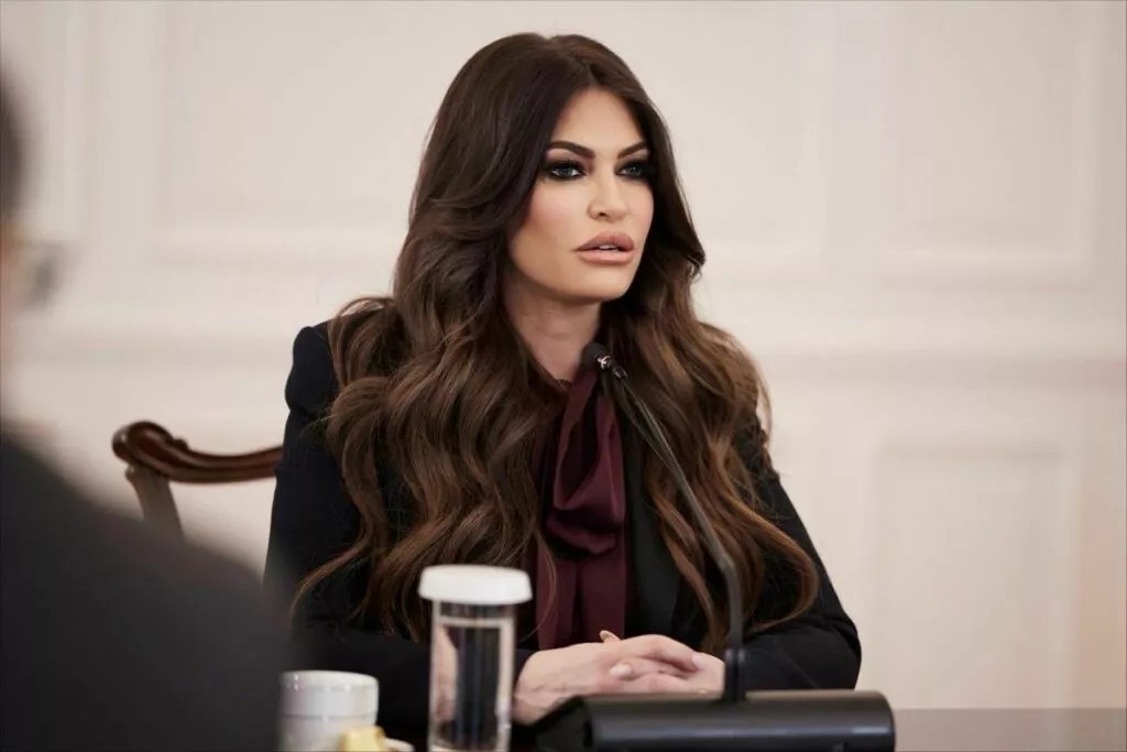 Kimberly Guilfoyle seated at a meeting in Athens