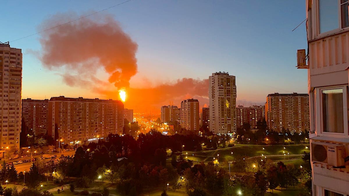 Fire burning at a Russian oil refinery at dusk