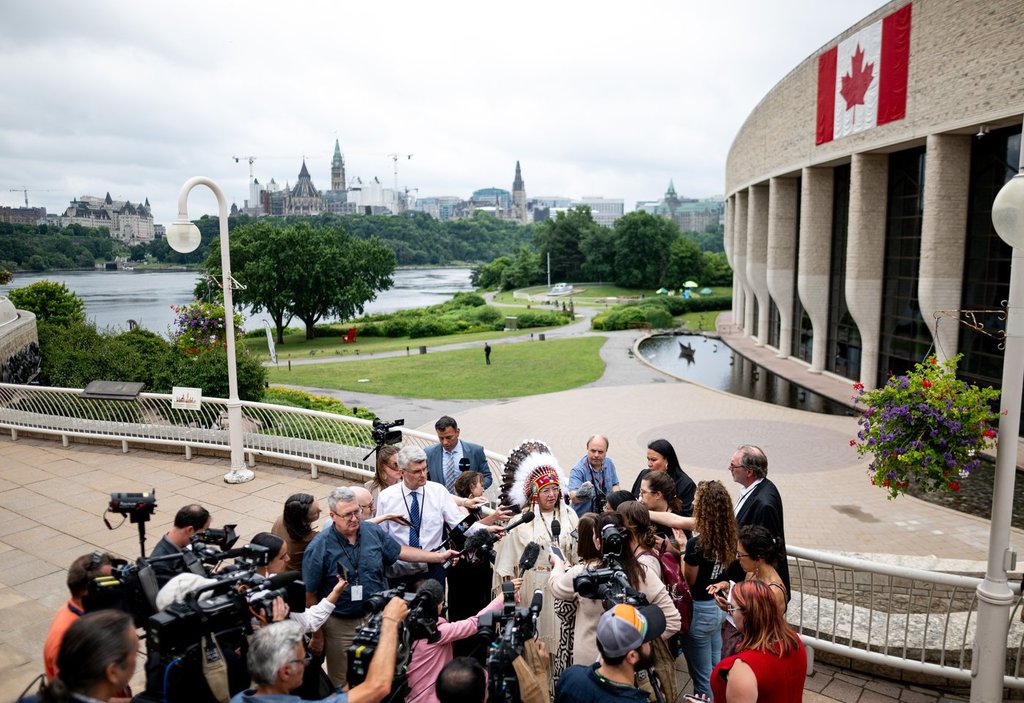 A First Nations leader speaks to reporters in Ottawa